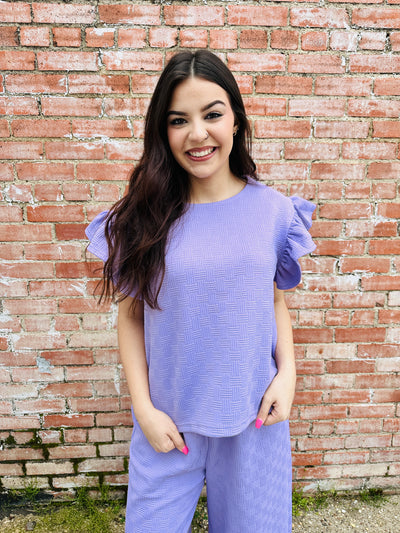 Make an Entrance Quilted Ruffle Sleeve Top • Lavender-Umgee-Shop Anchored Bliss Women's Boutique Clothing Store